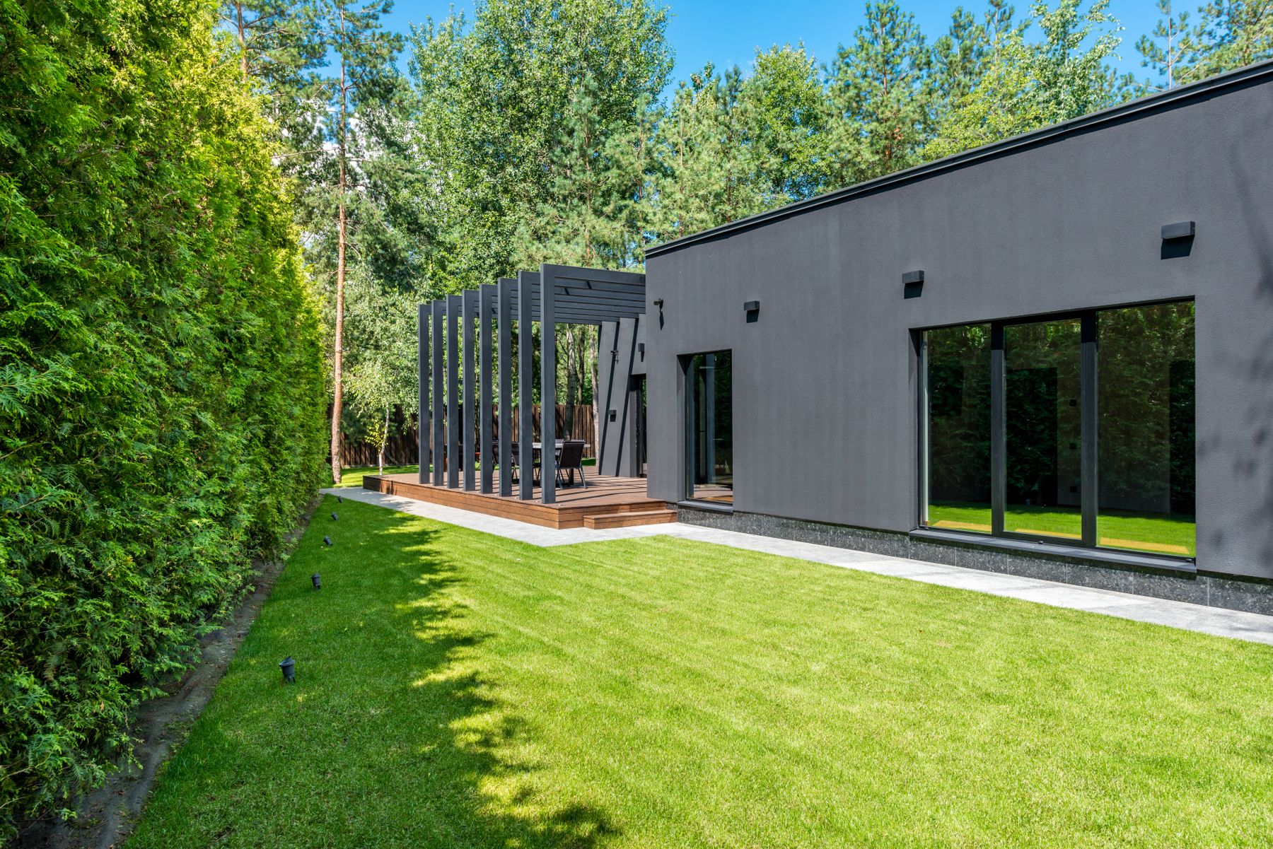 Contemporary home with patio, walkway and exterior walls